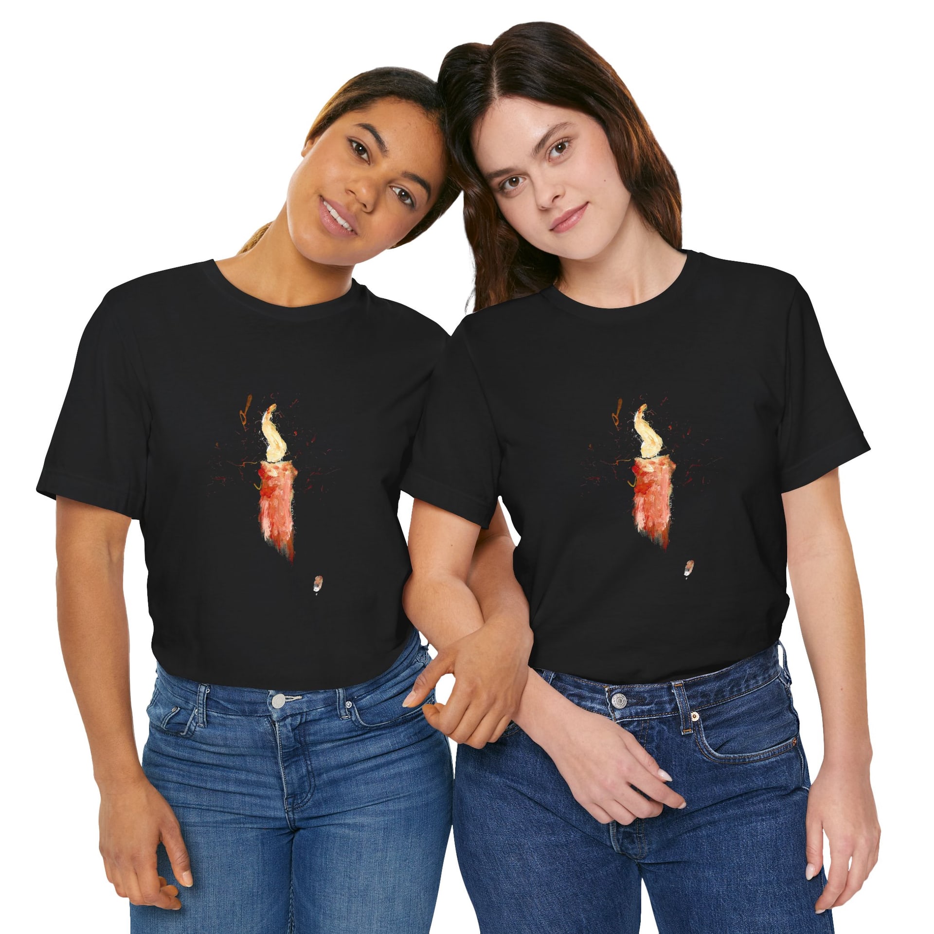 Two women stand side by side in the black candle t-shirt and blue jeans, the painted candle centred on each chest.