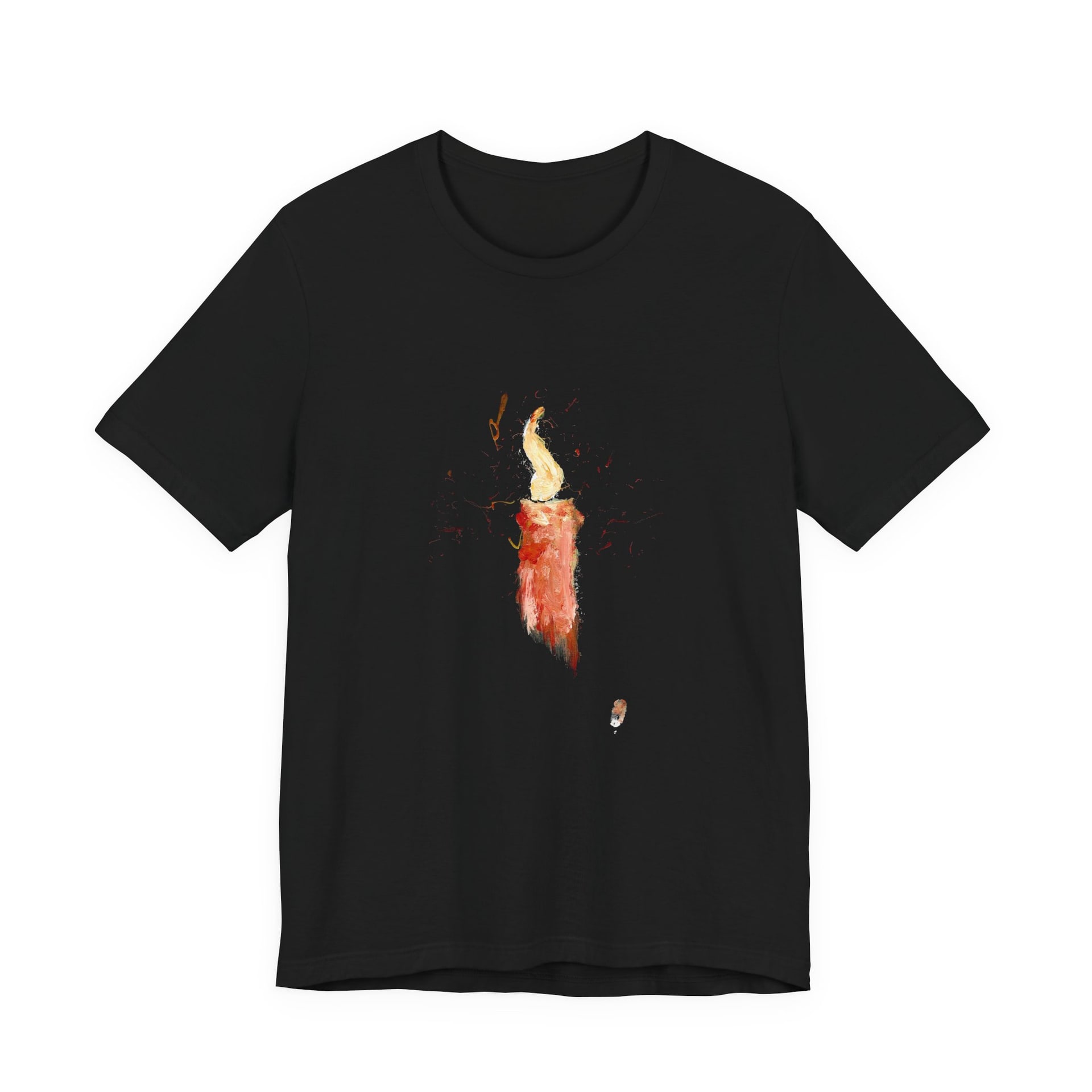 A black crew-neck t-shirt laid flat, printed at the chest with a painted red candle and its tall pale flame, sparks of red and orange flicking outward.