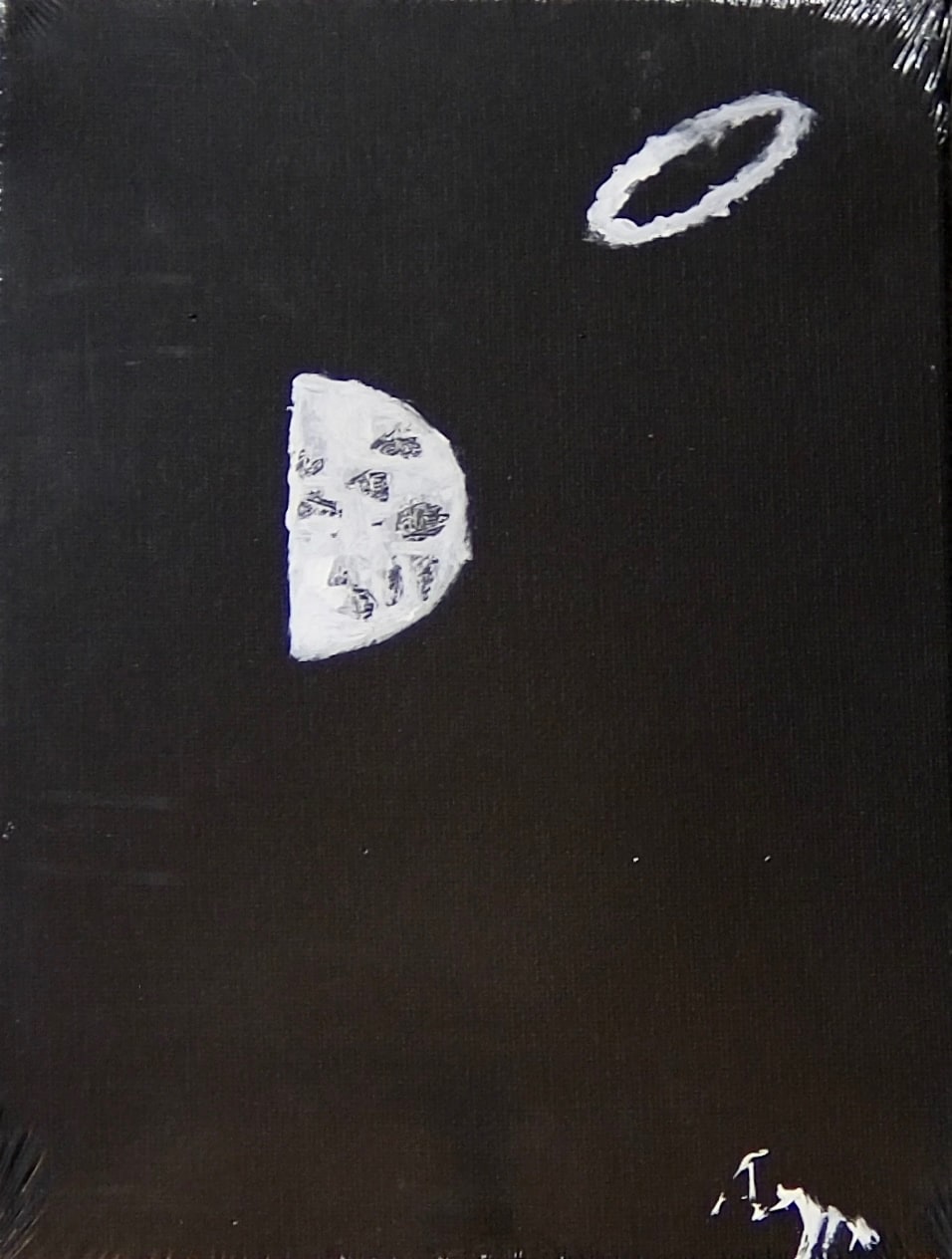 A half-lit moon, its craters scraped into thick white paint, sits left of centre on a deep black field. A small white ring hovers above it to the right.