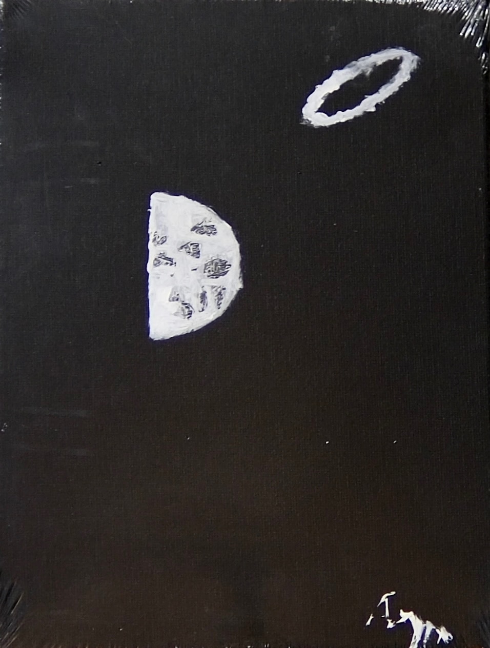 A half-lit moon, its craters scraped into thick white paint, sits left of centre on a deep black field. A small white ring hovers above it to the right.